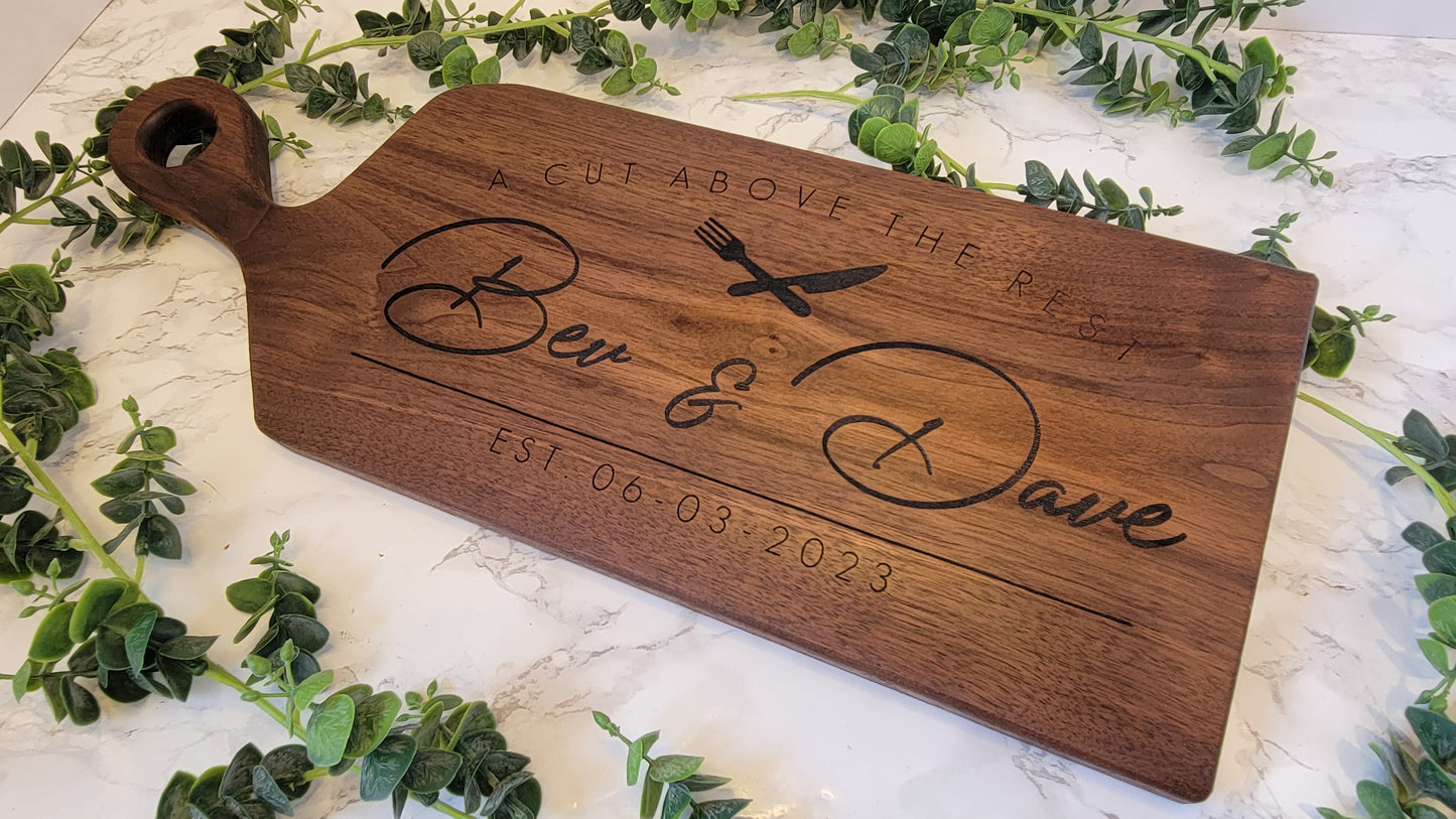 Handcrafted walnut charcuterie board for gifts.