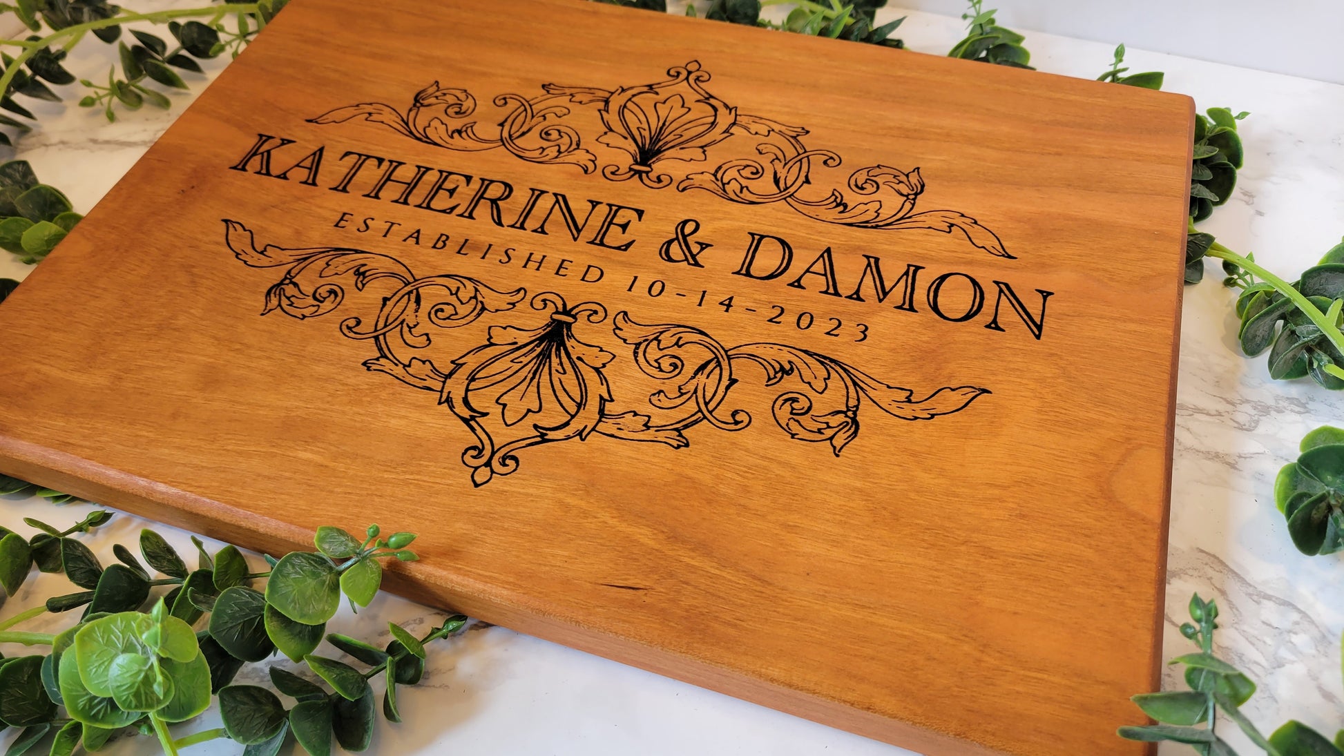 Custom cherry board with Baroque Engraving.